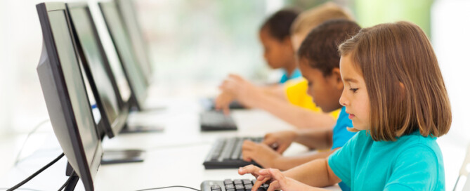 Kids Typing on Keyboards